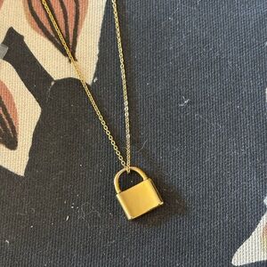 Gold lock pendant necklace